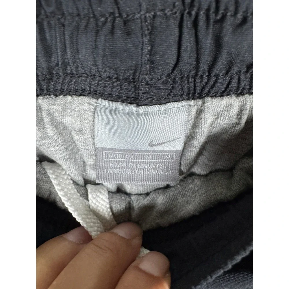 Y2K Nike Kids Track Pants Black White Side Stripe Jersey Lined Ankle Zip M 10-12